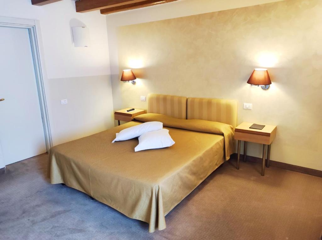 Katil atau katil-katil dalam bilik di Hotel Dependance Silvestro