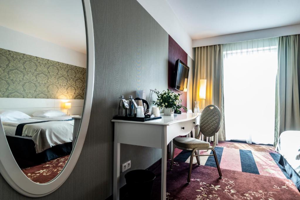Postel nebo postele na pokoji v ubytování Hotel Lamberton