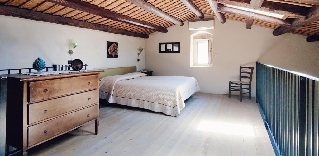 Posteľ alebo postele v izbe v ubytovaní Palazzo Gambuzza