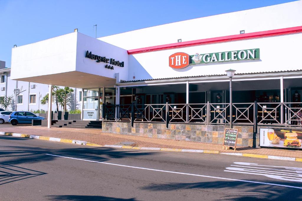 a fast food restaurant on a street corner at Margate Hotel in Margate