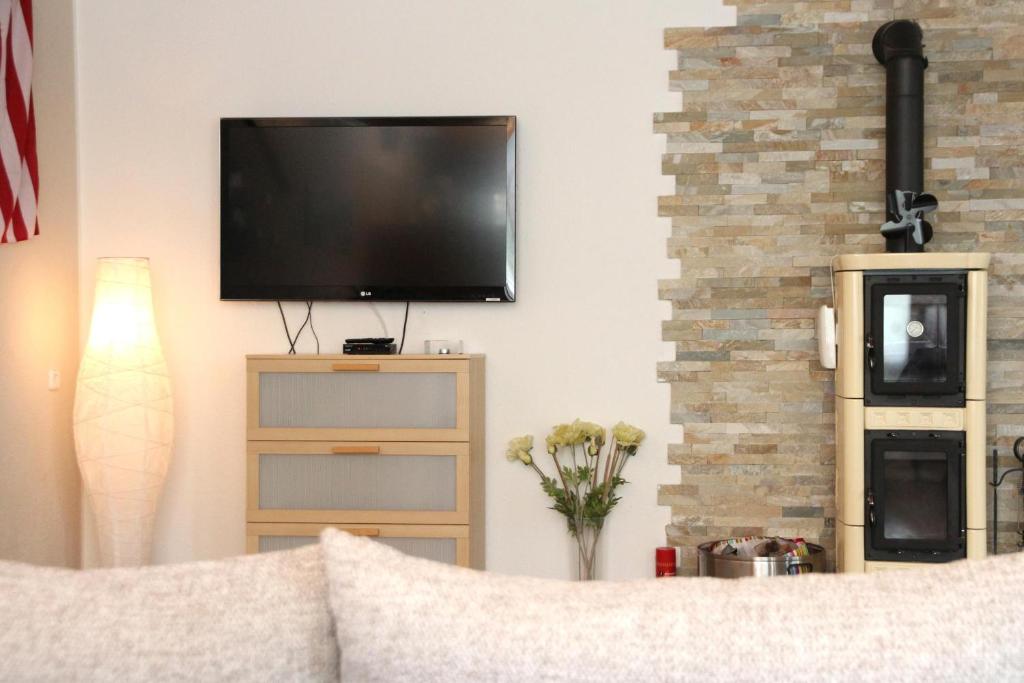 TV a/nebo společenská místnost v ubytování Ferienhaus Paschke Möhnesee Zentrum