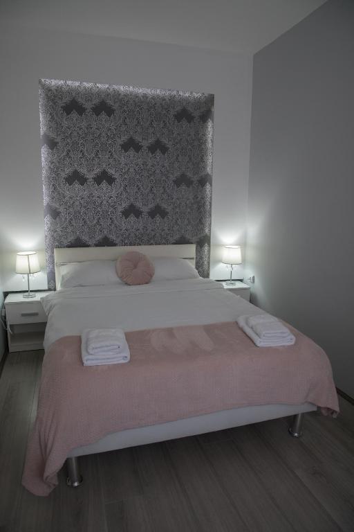 Postel nebo postele na pokoji v ubytování DIS apartman 1