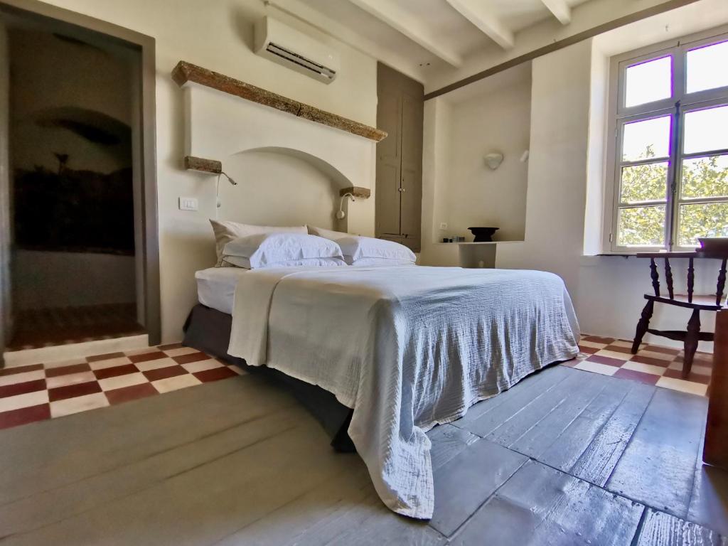 Postel nebo postele na pokoji v ubytování 1900 Hotel