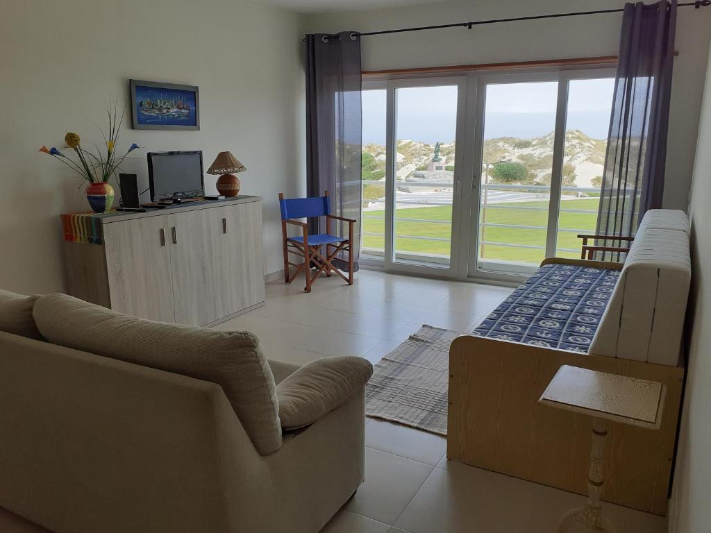 TV/trung tâm giải trí tại Praia Residence - frente à praia e vista mar