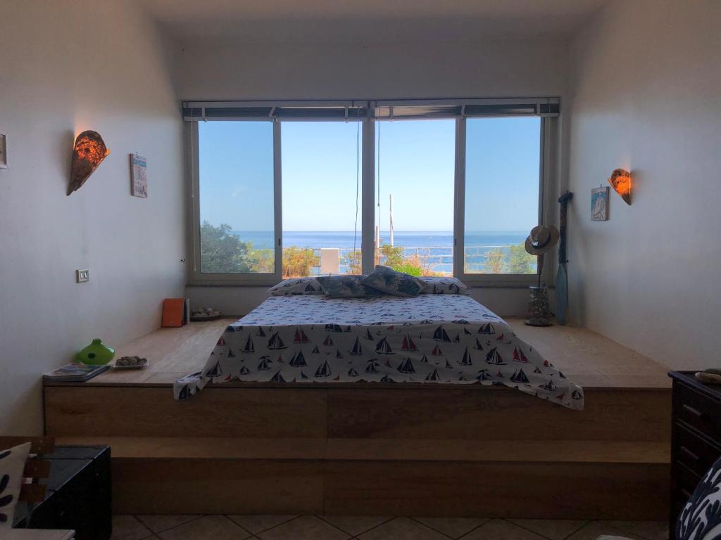Postel nebo postele na pokoji v ubytování Casa Piccola Mazzarò
