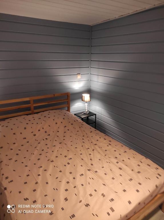 Postel nebo postele na pokoji v ubytování La Coccinelle