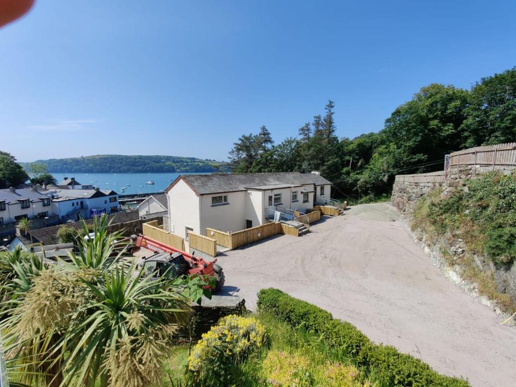 a house on the side of a dirt road at Crow's Nest Glandore - 4 - Self Catering in Glandore