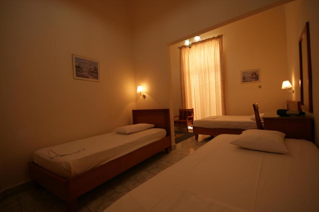 Posteľ alebo postele v izbe v ubytovaní Lena Hotel