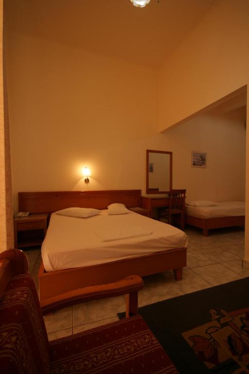 Posteľ alebo postele v izbe v ubytovaní Lena Hotel