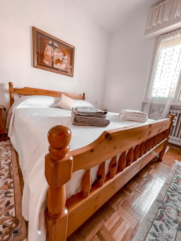 A bed or beds in a room at Casa Vacanze Annarita