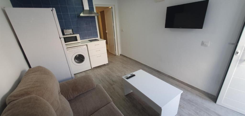 TV a/nebo společenská místnost v ubytování Apartamento La Chanca