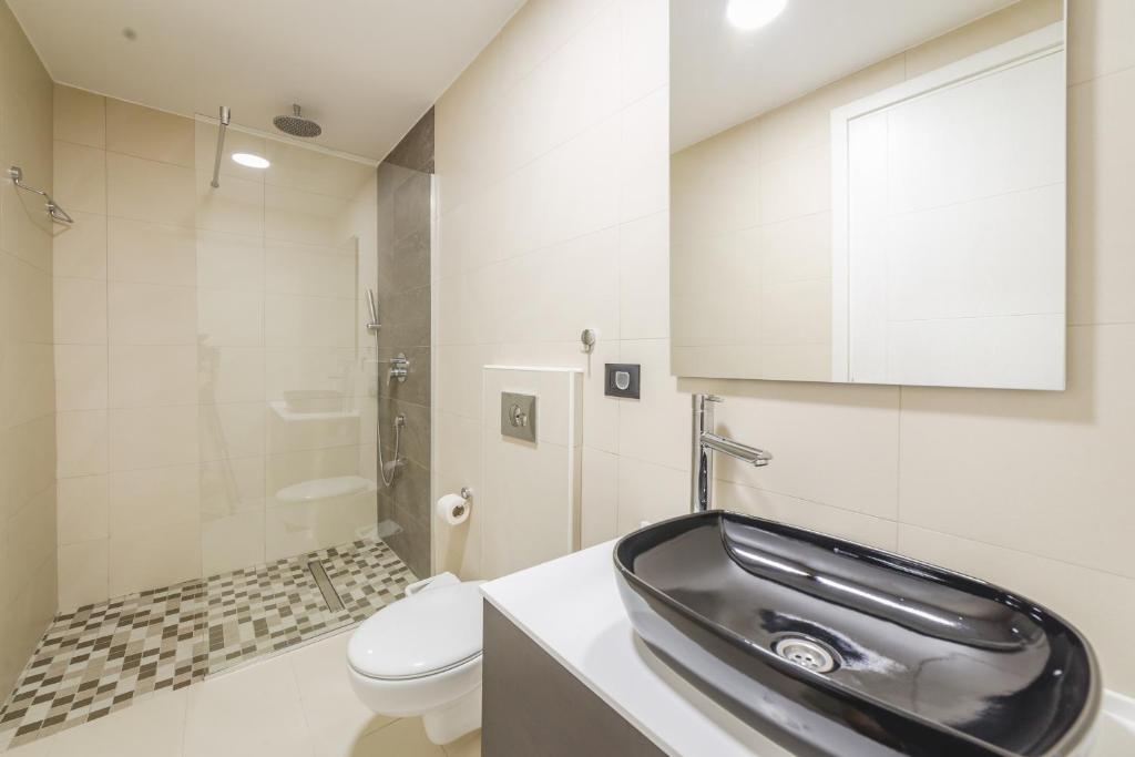 Koupelna v ubytování Poseidon Apartments