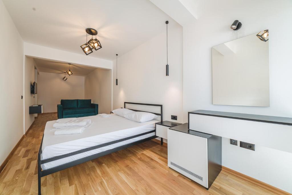 Postel nebo postele na pokoji v ubytování Poseidon Apartments