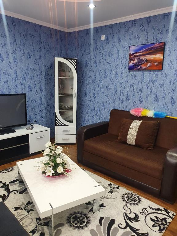 Televiisor ja/või meelelahutuskeskus majutusasutuses Hotel Exotica