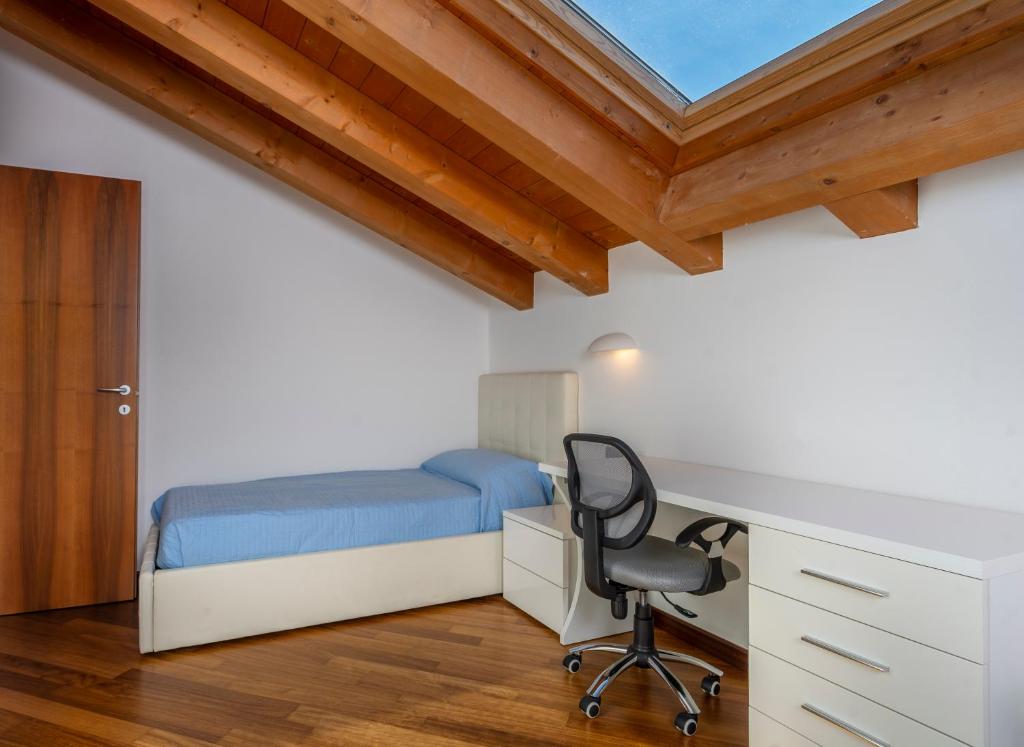Postel nebo postele na pokoji v ubytování New Deal - APT with Terrace, Jacuzzi & Netflix