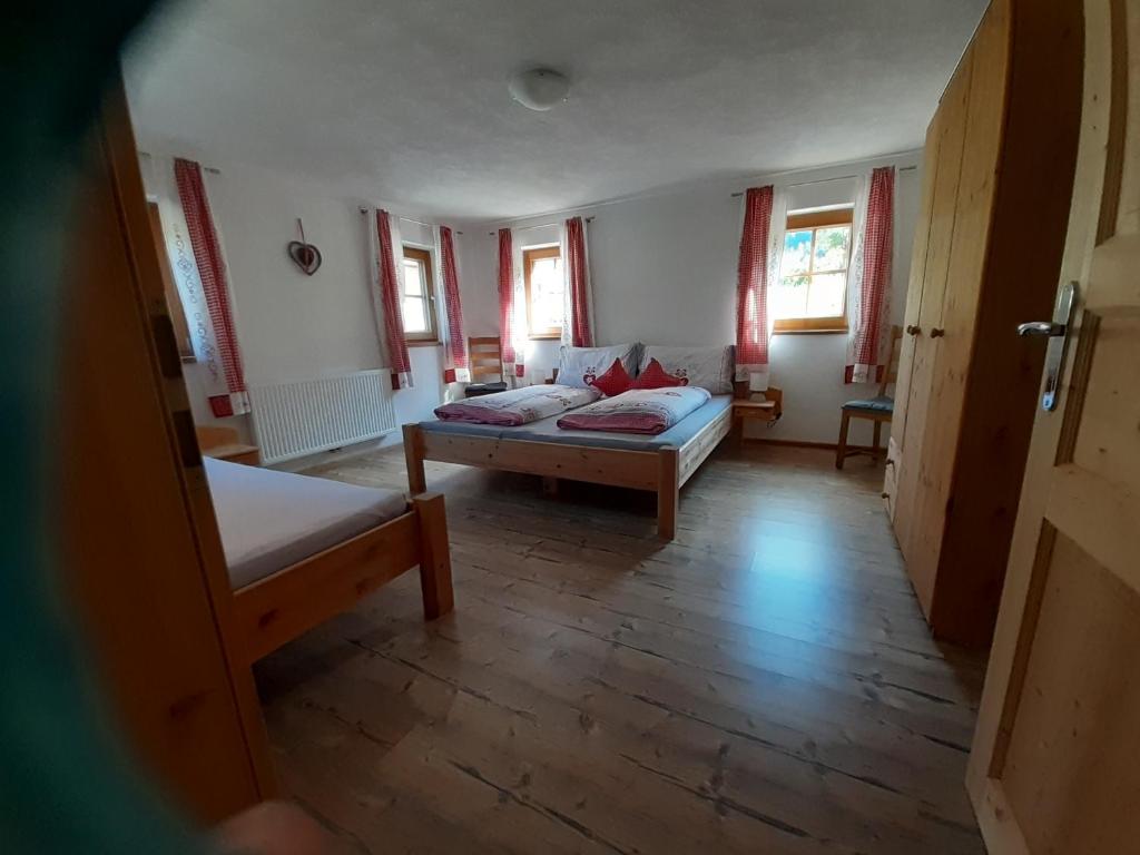 Postel nebo postele na pokoji v ubytování Haus Elfriede
