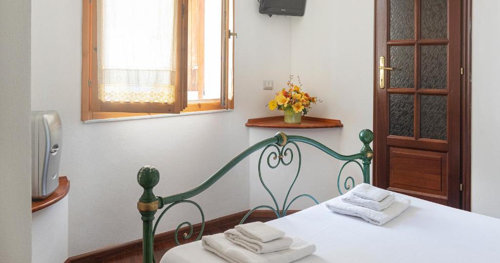 Postel nebo postele na pokoji v ubytování Welcomely - Bed and Dream