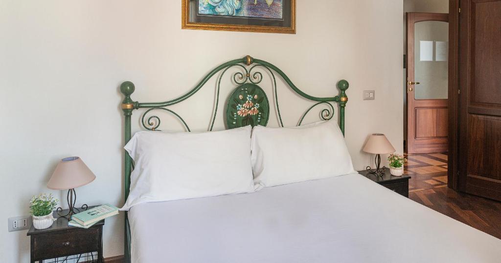 Postel nebo postele na pokoji v ubytování Welcomely - Bed and Dream