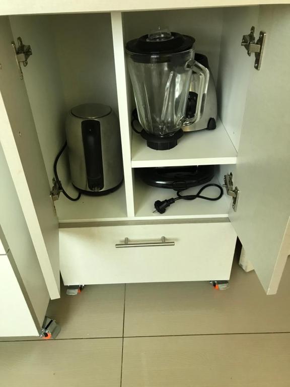 Kuchyň nebo kuchyňský kout v ubytování Rooms MD