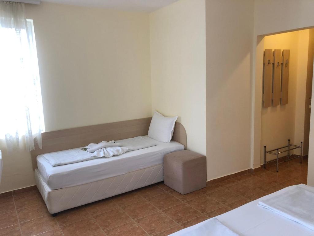 Postel nebo postele na pokoji v ubytování Borko Guest House