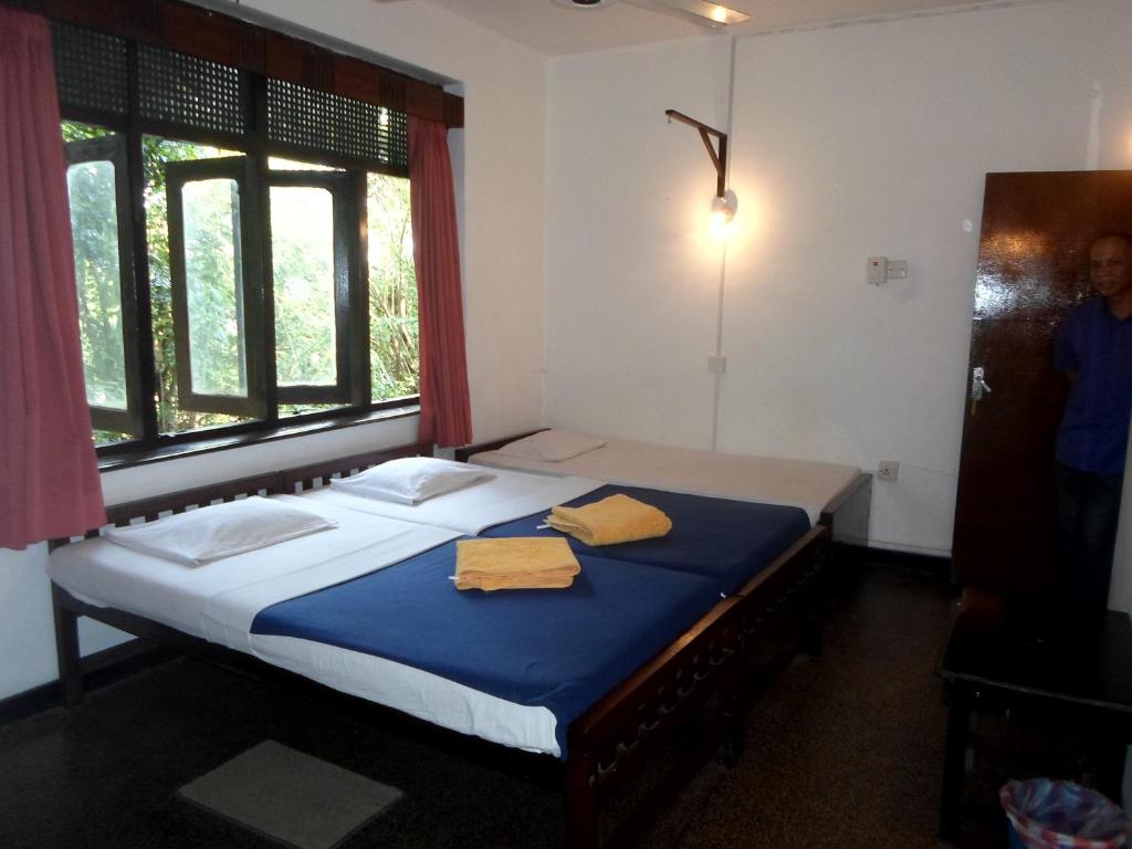 Postel nebo postele na pokoji v ubytování Drop Hostel