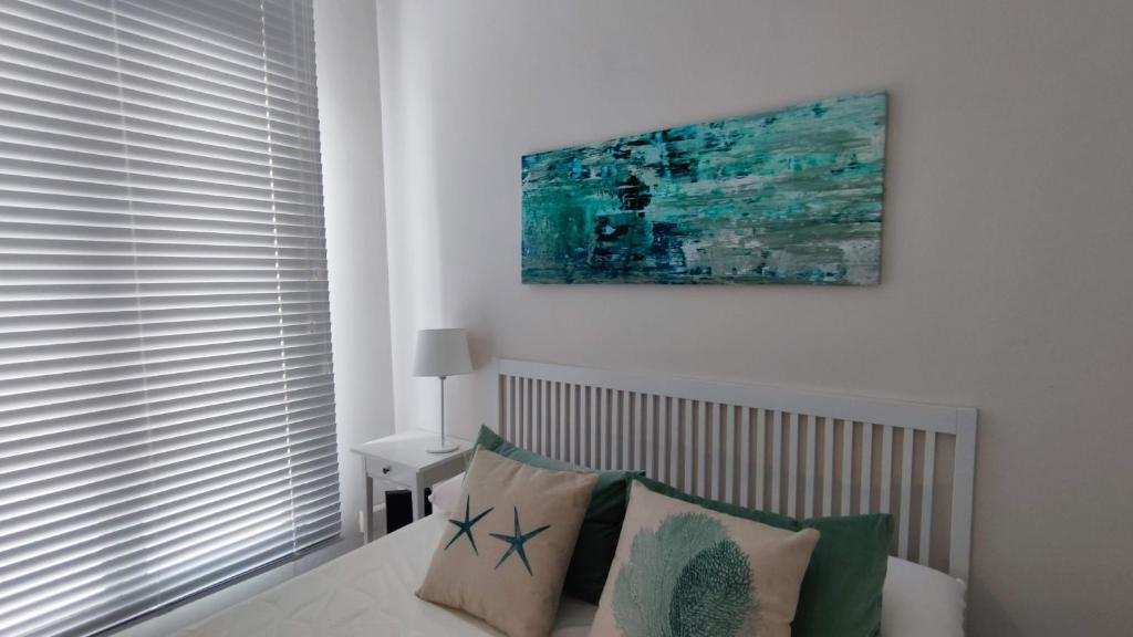 Posteľ alebo postele v izbe v ubytovaní APARTAMENTOS MINA4 tipo I