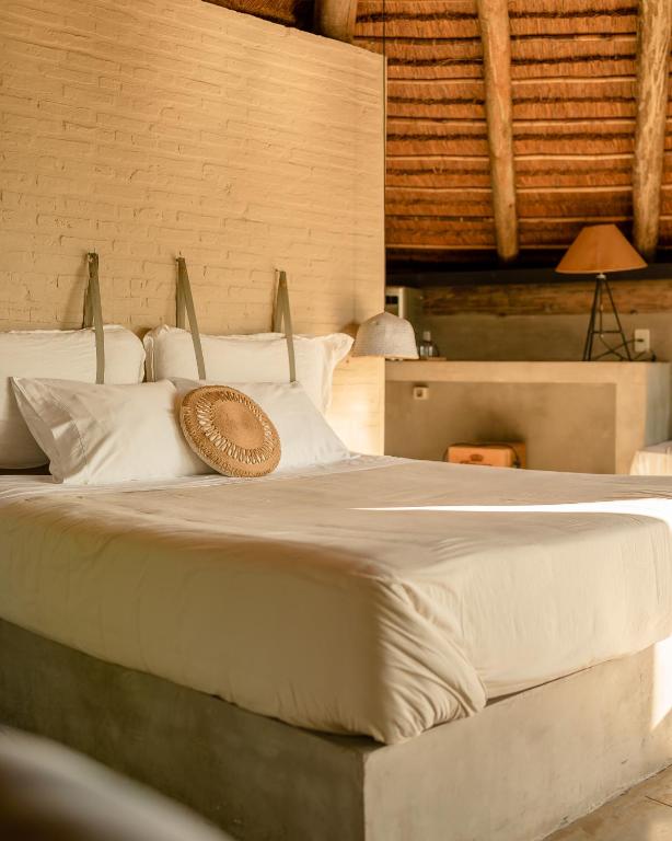Postel nebo postele na pokoji v ubytování Tava Glamping Cerro