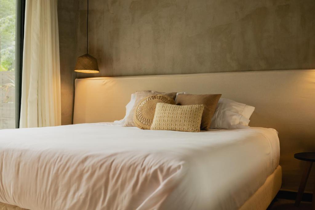Postel nebo postele na pokoji v ubytování Tava Glamping Cerro