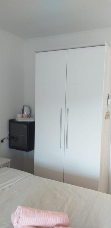 Postel nebo postele na pokoji v ubytování Rooms Korina & Mauro Ropa Mljet