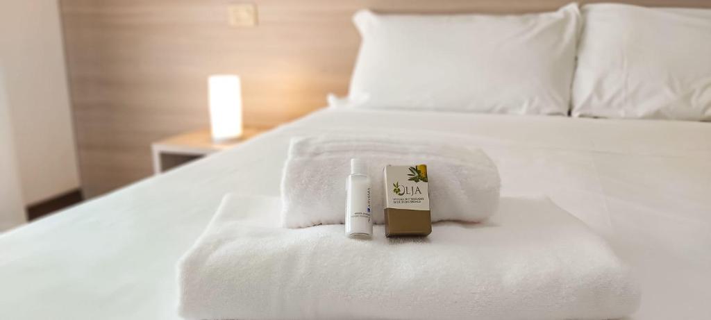 Postel nebo postele na pokoji v ubytování Hotel Ammare