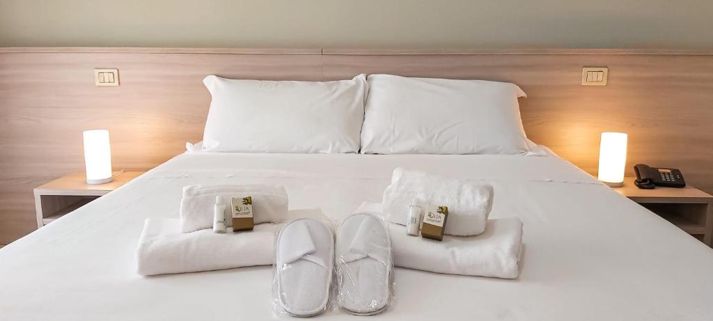Postel nebo postele na pokoji v ubytování Hotel Ammare
