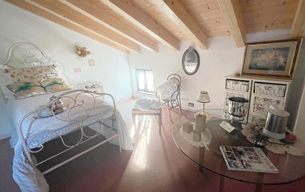 Postel nebo postele na pokoji v ubytování Villa Camilla