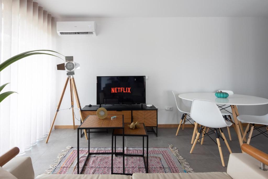 TV a/nebo společenská místnost v ubytování Abraços dos Avós - Casas de aldeia