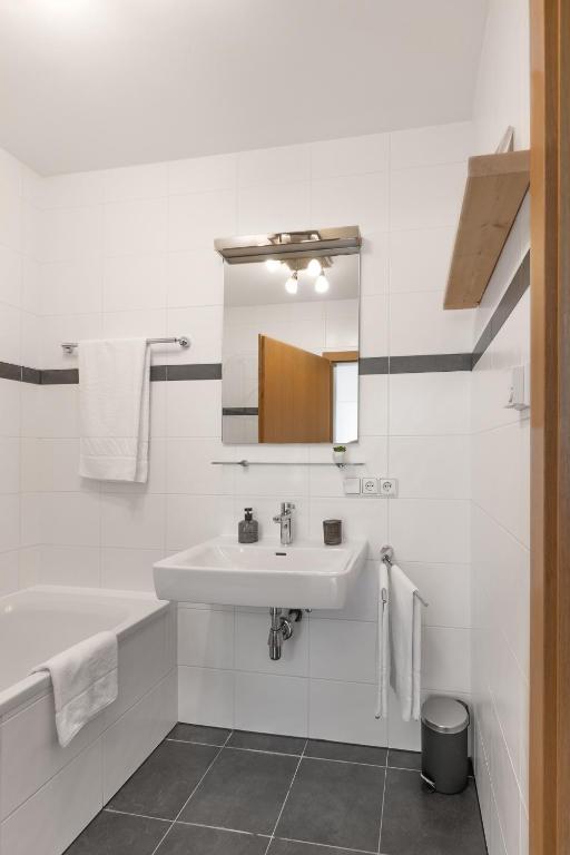 A bathroom at Spacious Chalet Helen - 2 Saunas, 5 Bedrooms, 7 Bathrooms in Kaprun