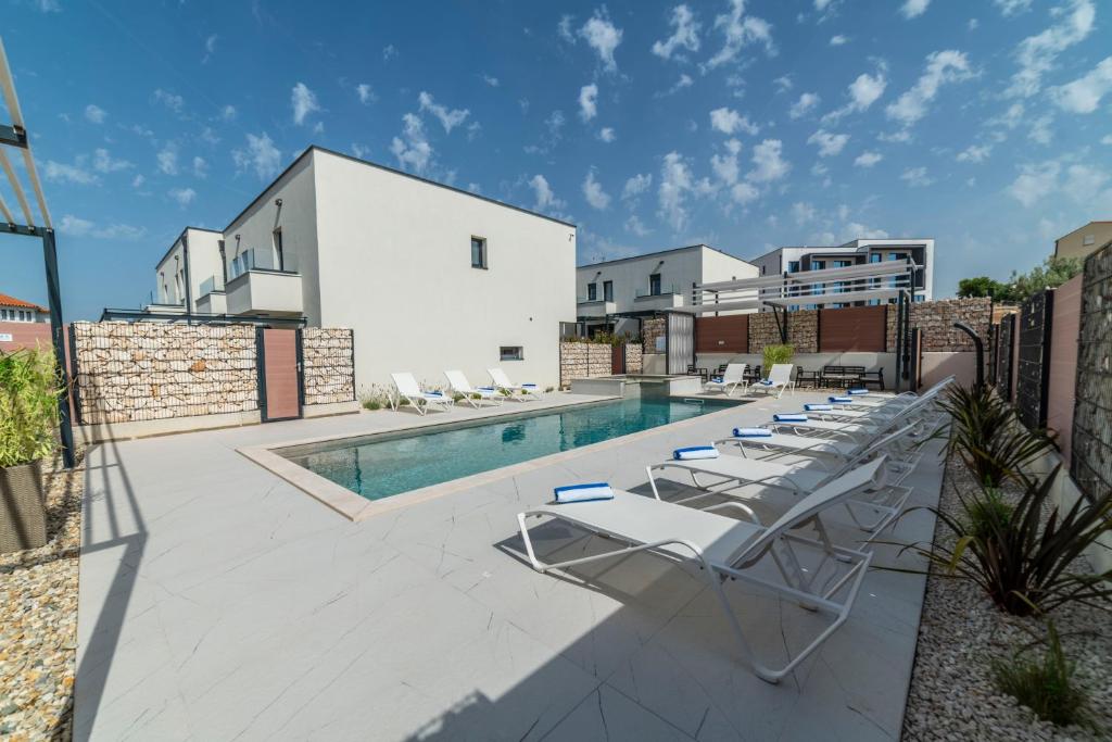 Basen w obiekcie PINNA RESIDENCE - Datul lub w pobliżu