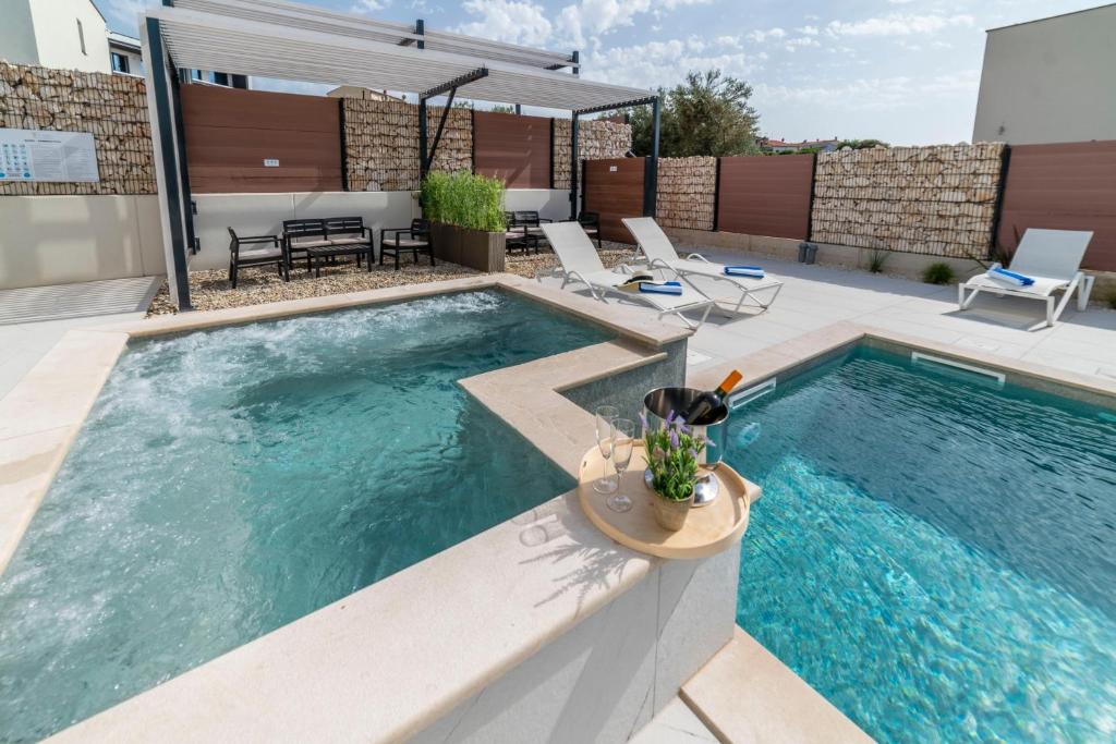 Basen w obiekcie PINNA RESIDENCE - Datul lub w pobliżu