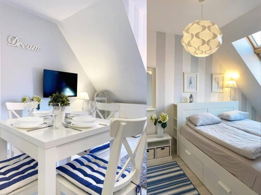 Posteľ alebo postele v izbe v ubytovaní APARTAMENT AURA TORUŃSKA 15