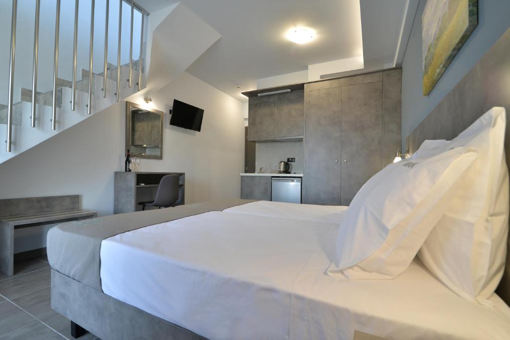 Postel nebo postele na pokoji v ubytování MAK Apartments