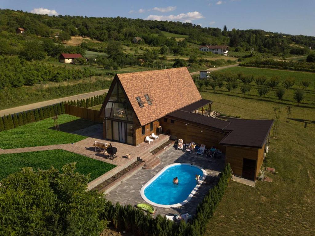 an overhead view of a house with a swimming pool at Fruska in Sremski Karlovci