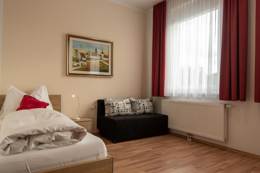 Posteľ alebo postele v izbe v ubytovaní City Appartements Weiz