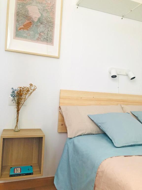 Postel nebo postele na pokoji v ubytování Apartamento The Wall Xperience