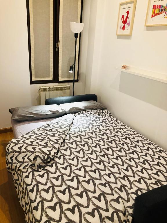 Postel nebo postele na pokoji v ubytování Apartamento The Wall Xperience