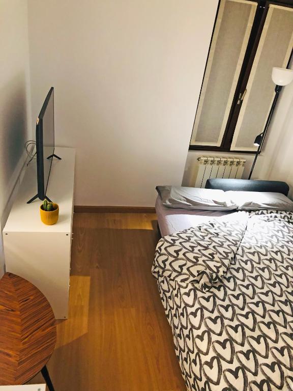 Postel nebo postele na pokoji v ubytování Apartamento The Wall Xperience
