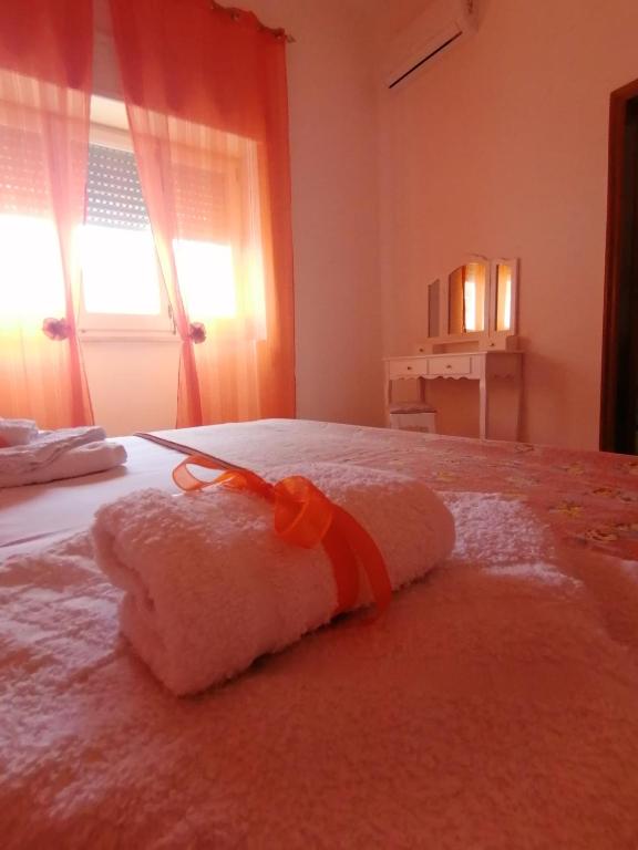 Postel nebo postele na pokoji v ubytování Il sole