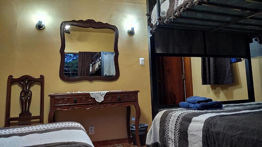 Postel nebo postele na pokoji v ubytování Posada Los Chaneques Catemaco