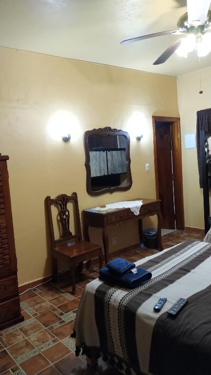 Postel nebo postele na pokoji v ubytování Posada Los Chaneques Catemaco