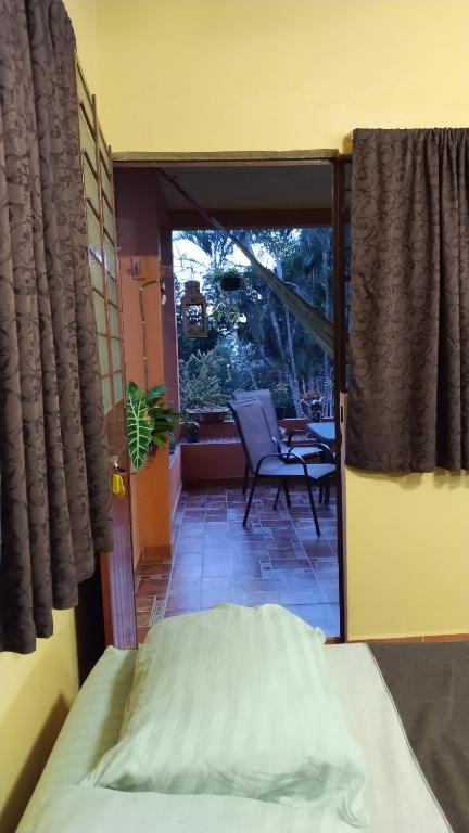 Postel nebo postele na pokoji v ubytování Posada Los Chaneques Catemaco