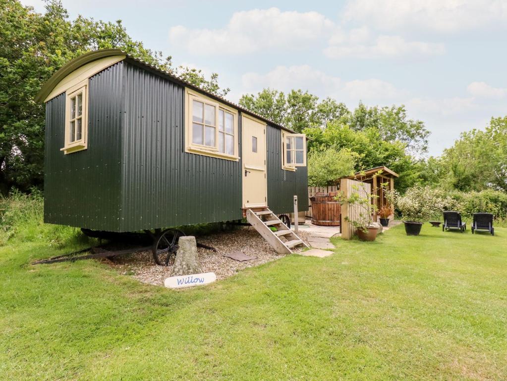 a tiny house sitting in a yard at Willow in Wadebridge