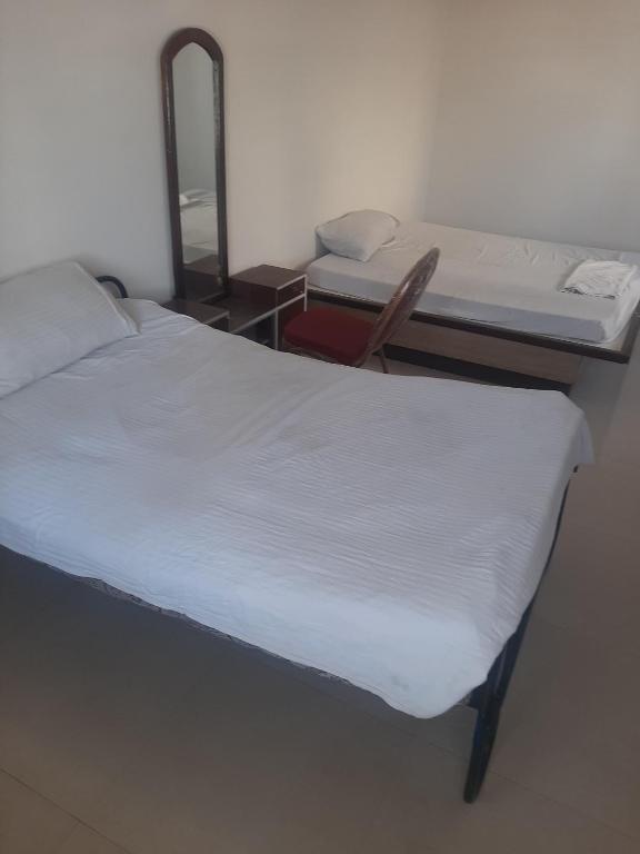 HOTEL SRI VAARI RESIDENCY - Bed In Mannelijke Slaapzaal Met 4 Bedden