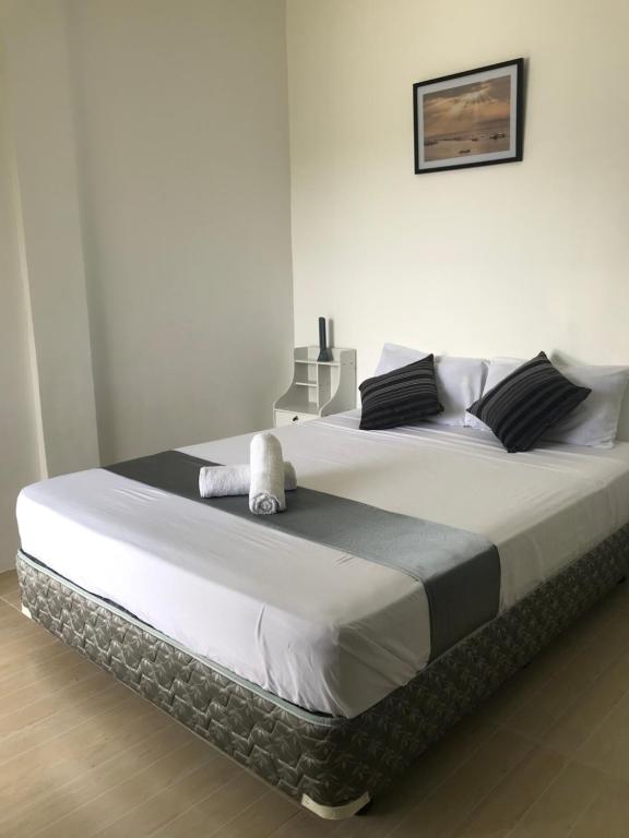 Postel nebo postele na pokoji v ubytování Paradise Beach Guest House